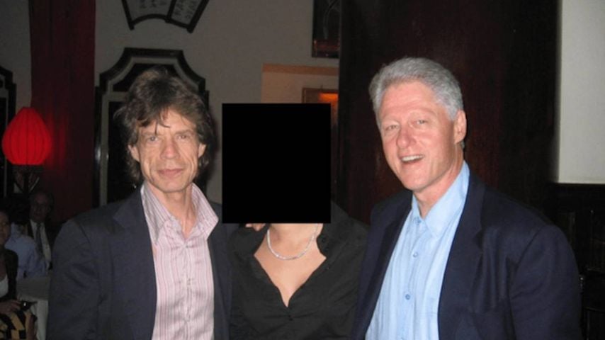 Bill Clinton und Mick Jagger posieren bei einem Event