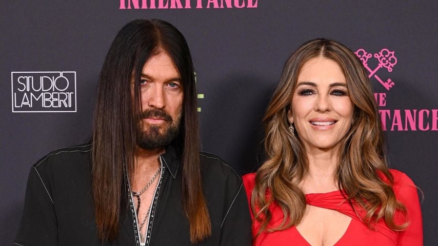 Billy Ray Cyrus und Elizabeth Hurley auf der Premiere von "The Inheritance", August 2025