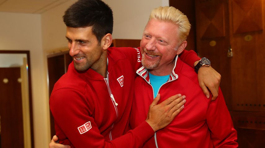 Boris Becker (r.) mit Novak Djokovic 2016 bei den French Open in Paris