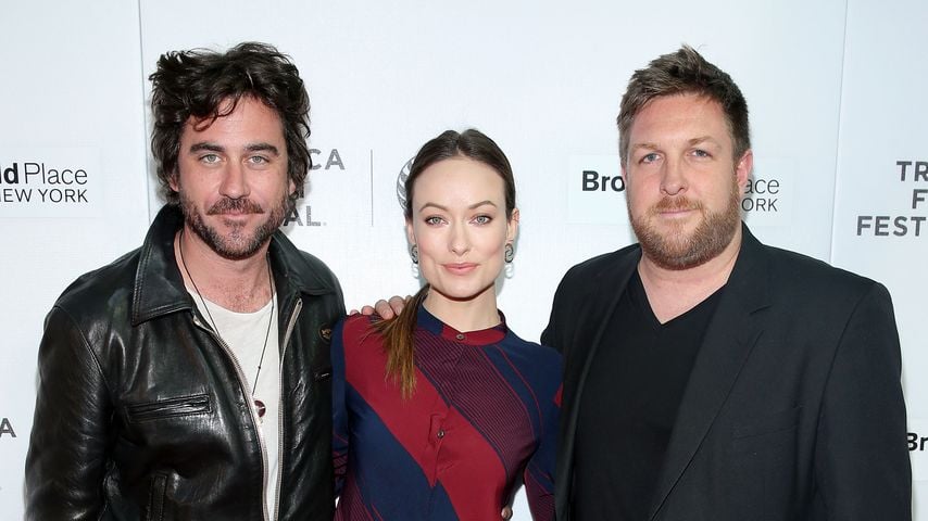 Bryn Mooser, Olivia Wilde und David Darg im April 2015