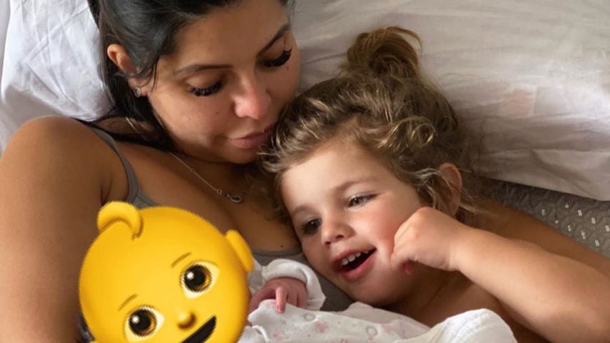 Cara de la Hoyde mit ihren beiden Kindern