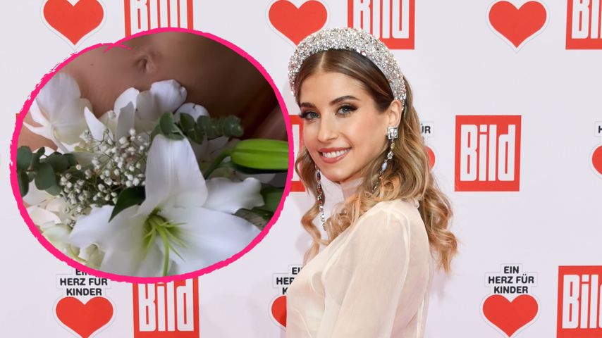 Fast komplett nackt: Cathy Hummels posiert mit Blumenstrauß!