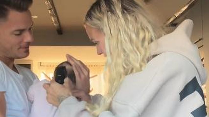 Cedric Beidinger und Eliza Klenner mit ihrem Baby