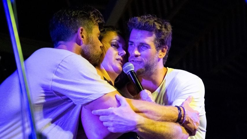 Chris Hemsworth, Celeste Barber und Liam Hemsworth bei einem Charity-Event in Byron Bay