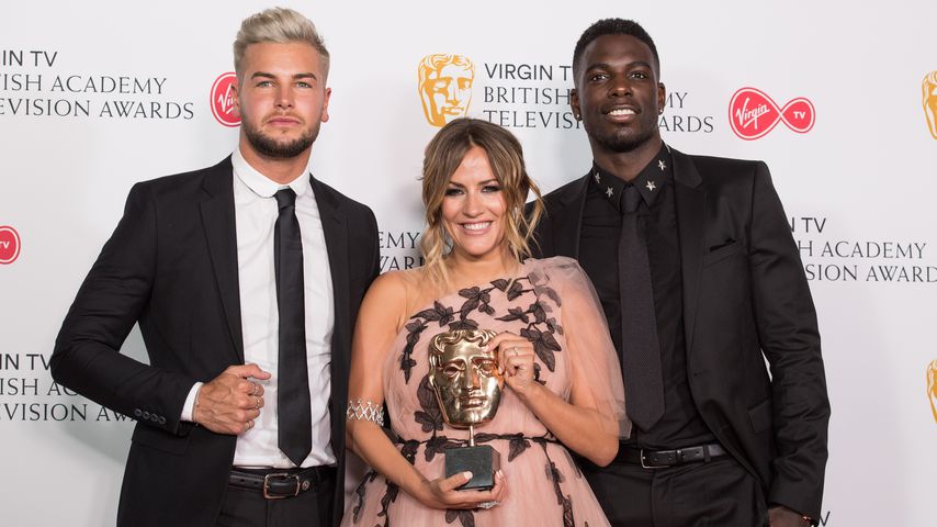 Chris Hughes, Caroline Flack und Marcel Somerville bei den BAFTAs in London im Mai 2018