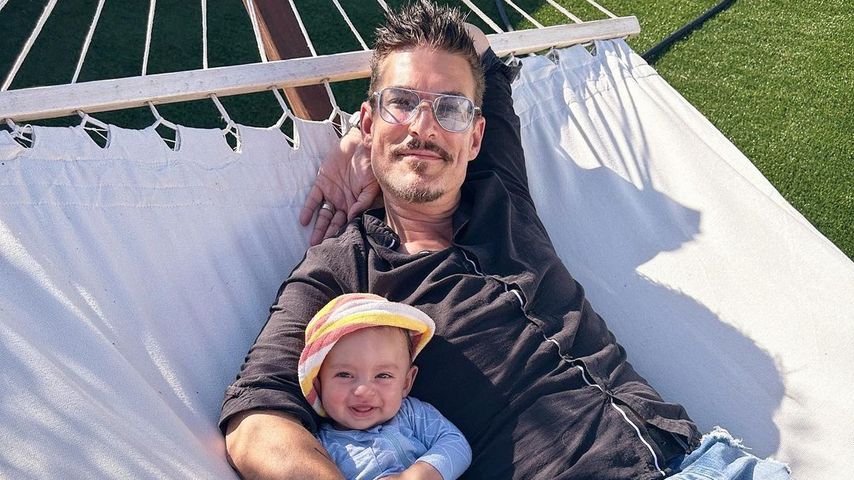Chris Töpperwien mit seinem Sohn Lino im Mai 2023