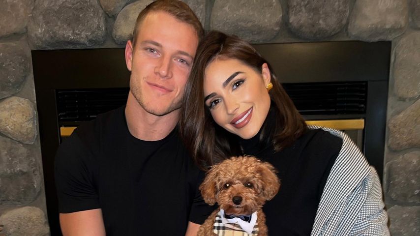 Christian McCaffrey, Olivia Culpo und Hund Oliver, November 2022