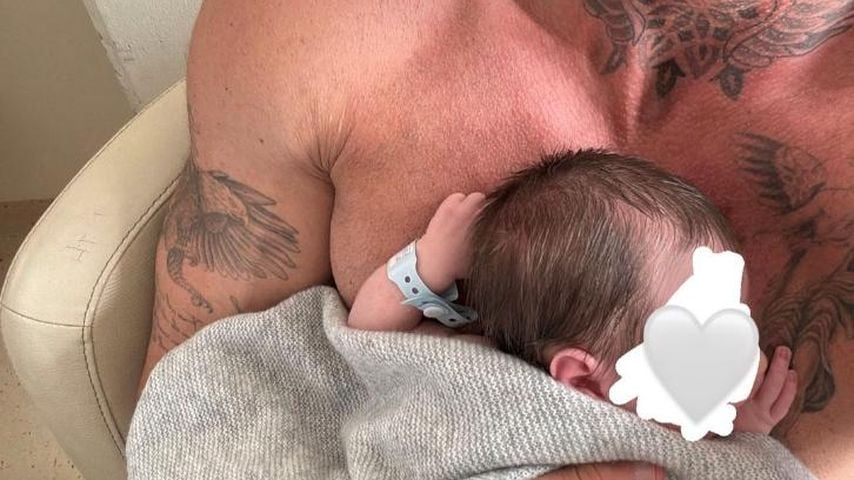 Christian Wolf mit seinem Baby, 2024