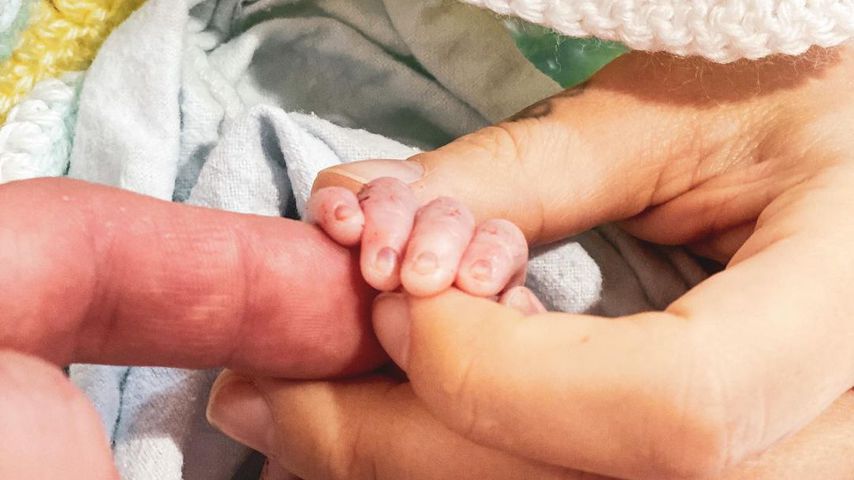 Christina Perri und ihr Mann Paul mit ihrer verstorbenen Tochter