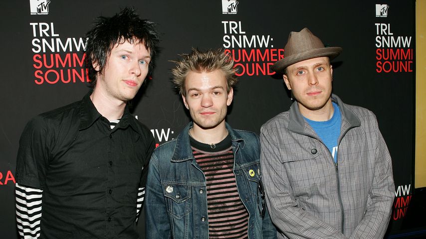 Cone McCaslin, Deryck Whibley und Steve Jocz, aktive und ehemalige Sum-41-Mitglieder 2007
