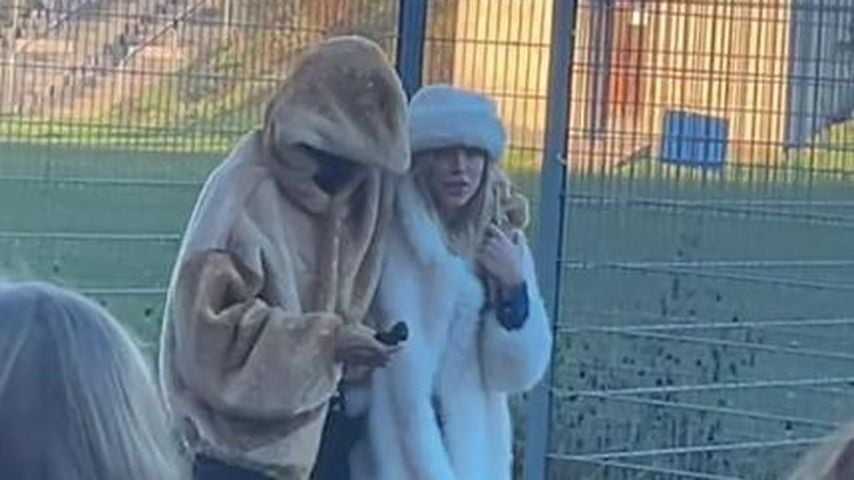 Cro und eine blonde Frau, Dezember 2024 in Nürnberg