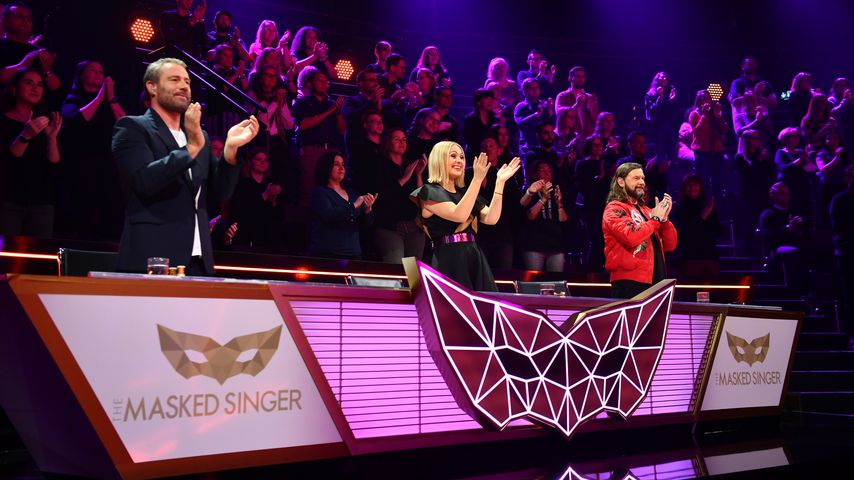 Das "The Masked Singer"-Rateteam beim Finale im November 2021