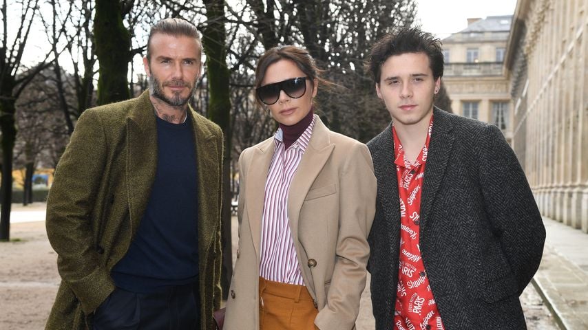 David, Victoria und Brooklyn Beckham auf der Fashion Week in Paris