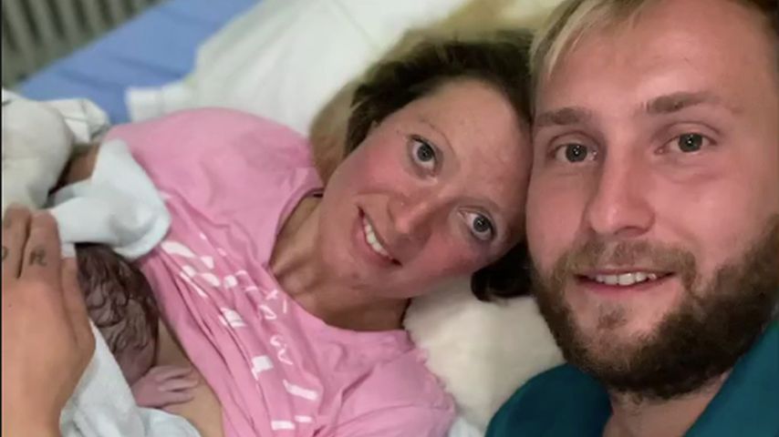 Denise Munding und Nils Dwortzak mit ihrem Baby