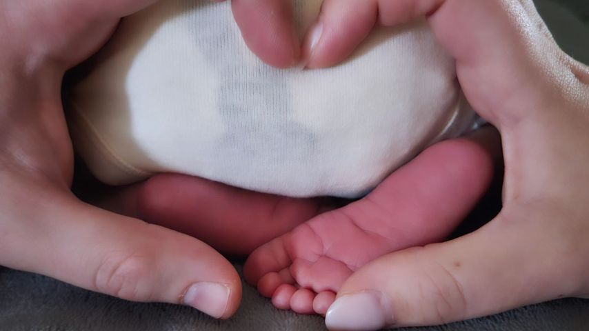 Dennis und Lisa mit ihrem Baby