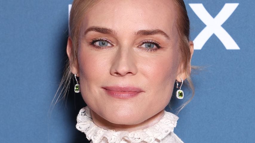 Diane Kruger bezaubert in einem weißen Spitzenminikleid