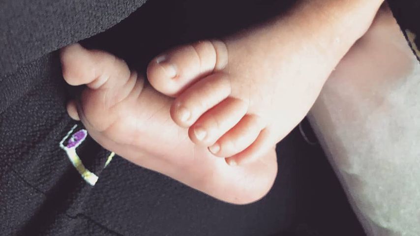 Die Füße von Miss Platnums Baby
