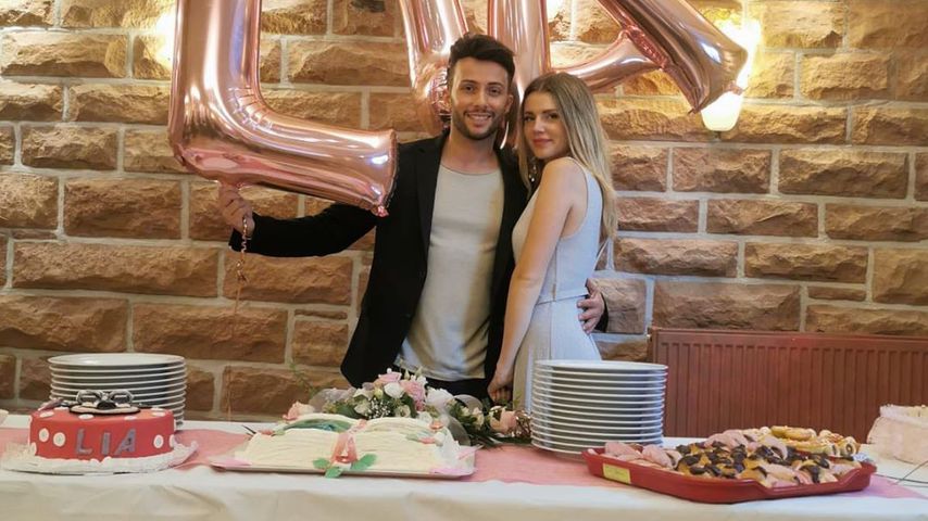 Domenico de Cicco und Julia an Lias Taufe, September 2019