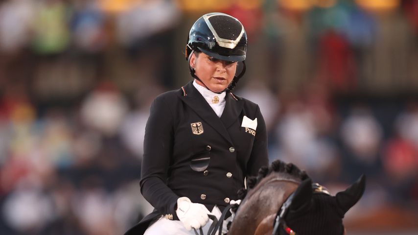 Dorothee Schneider und ihr Pferd Showtime FRH