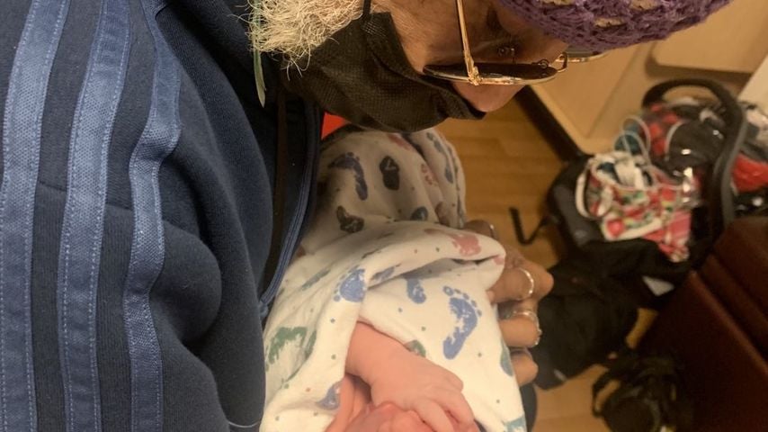 Dr. Karamo Chilombo mit seinem Sohn