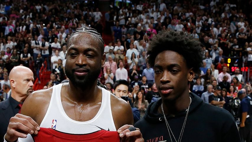 Dwyane und Zaire Wade posieren
