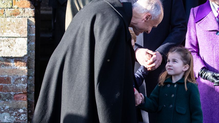 Der Priester der St. Mary Magdalene Church in Sandringham und Prinzessin Charlotte