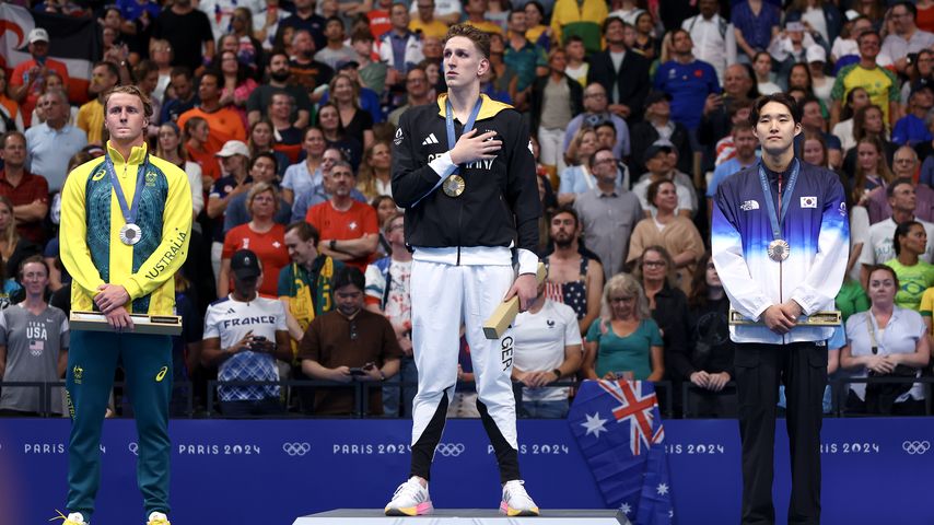 Elijah Winnington, Lukas Martens und Woomin Kim bei den Olympischen Sommerspielen 2024