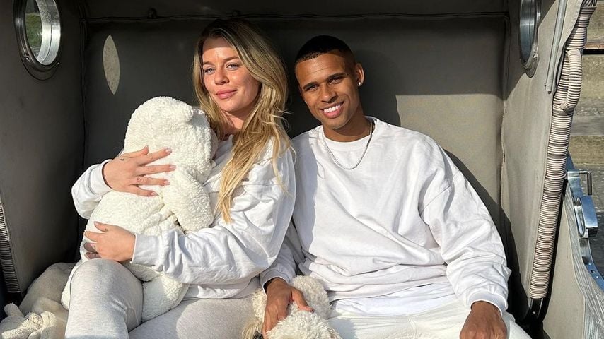 Emely Hüffer und Kevin Njie mit ihrem Sohn Ocean