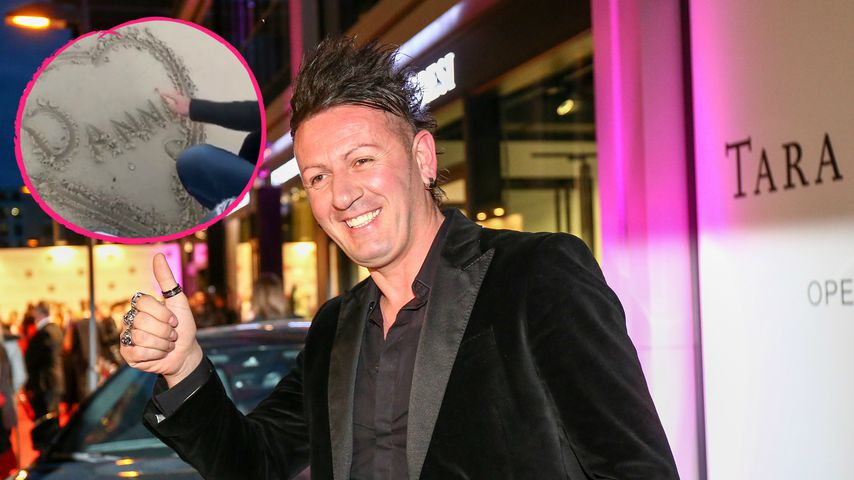 Erstes Liebesstatement: Ennesto schreibt "Danni" in den Sand