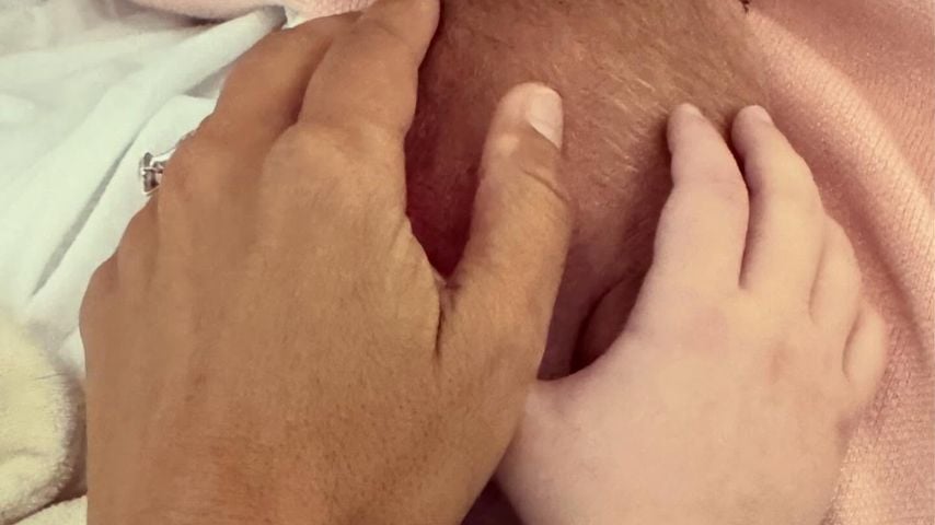 Erin Oudshoorn, ihr Partner Dave und Tochter Lulus Hand, Januar 2026