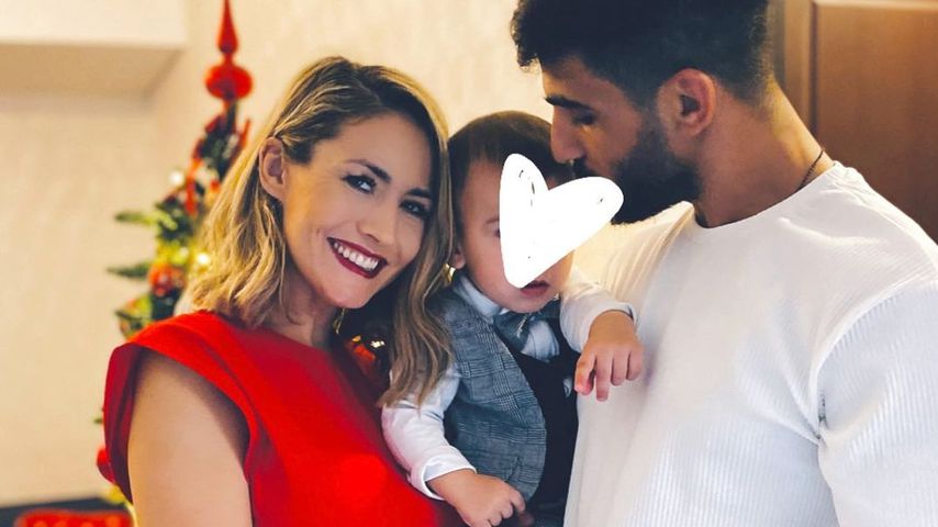 Fiona Erdmann mit ihrem Sohn Leo und Partner Moe, Weihnachten 2021