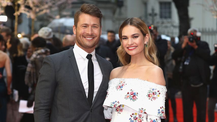 Glen Powell und Lily James, April 2018