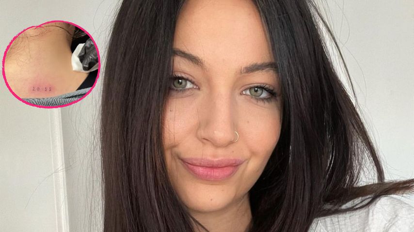 Hannah Kerschbaumer lässt sich für ihren Sohn Tattoo stechen