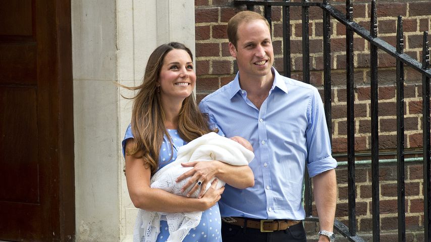 Herzogin Kate und Prinz William mit Prinz George im Juli 2013
