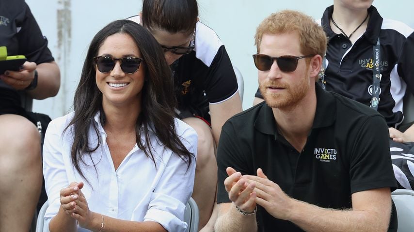 Stellten Prinz Harry und Meghan sich den Fotografen bewusst?