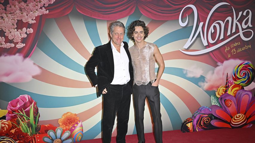 Hugh Grant und Timothée Chalamet im Dezember 2023