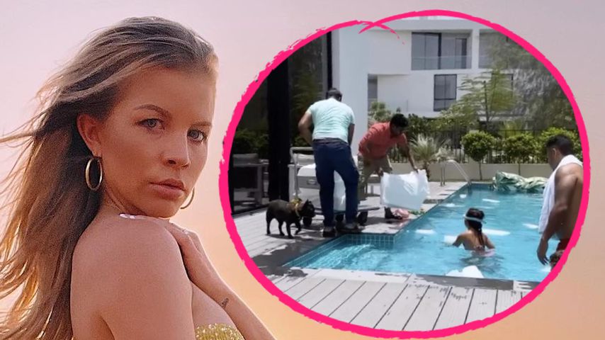 40 Grad in Dubai: Ina Aogo kühlt Pool mit XXL-Eiswürfel ab
