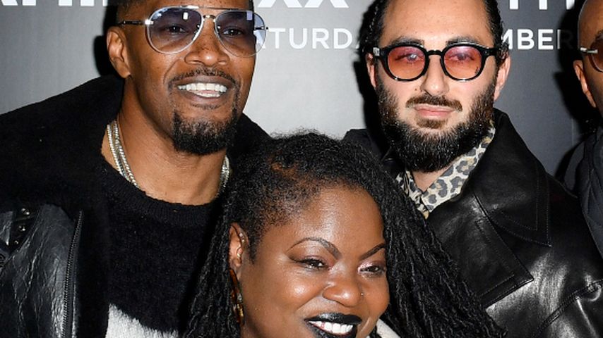 Jamie Fox mit seiner Schwester und einem Freund