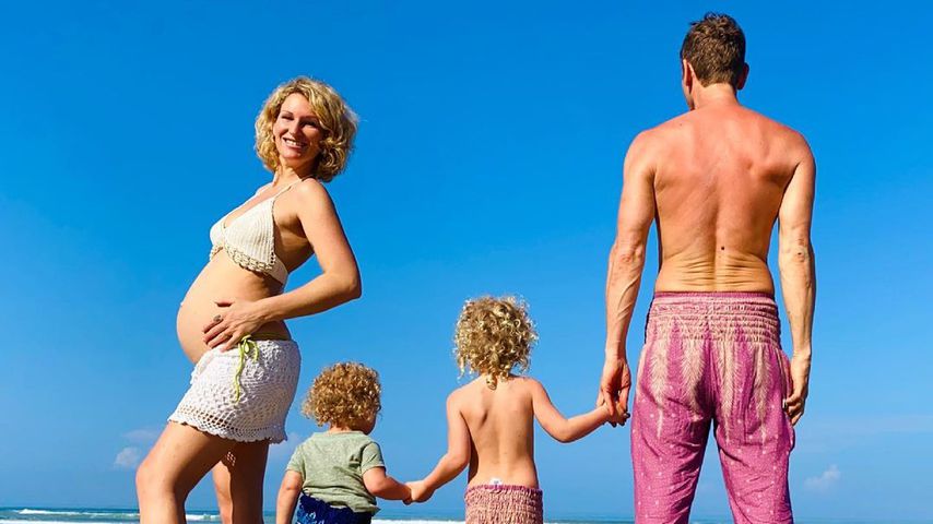 Janni und Peer Kusmagk mit ihren zwei Kindern, 2021