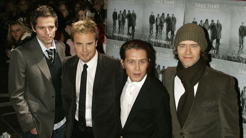 Jason Orange, Gary Barlow, Mark Owen und Howard Donald von Take That