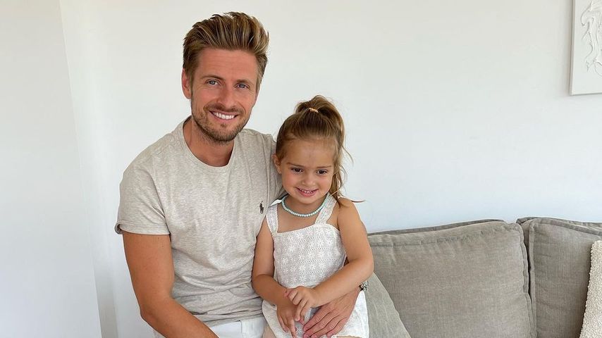 Jörn Schlönvoigt mit seiner Tochter im August 2022