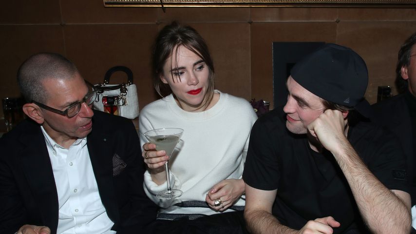 Jonathan Newhouse, Suki Waterhouse und Robert Pattinson im Januar 2020 in Paris