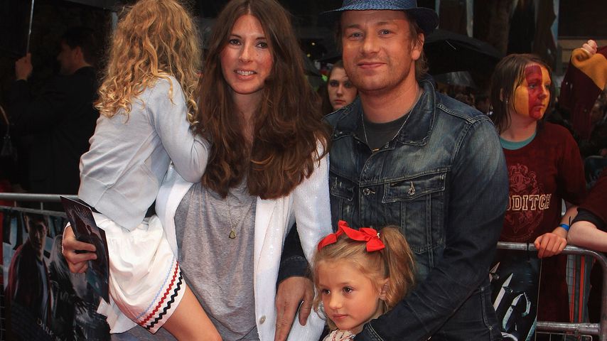 Jools und Jamie Oliver mit zwei ihrer Kinder bei der "Harry Potter 6"-Premiere in London, Juli 2009