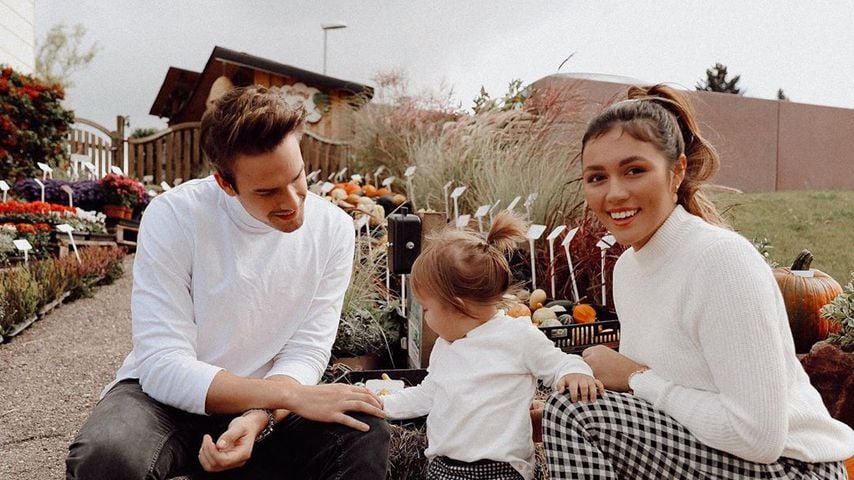 Julian Gutjahr und Anna Maria Damm mit ihrer Tochter Eliana