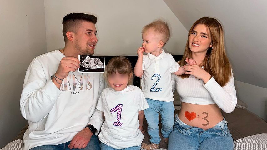 Julita mit ihrem Partner und ihren beiden Kindern