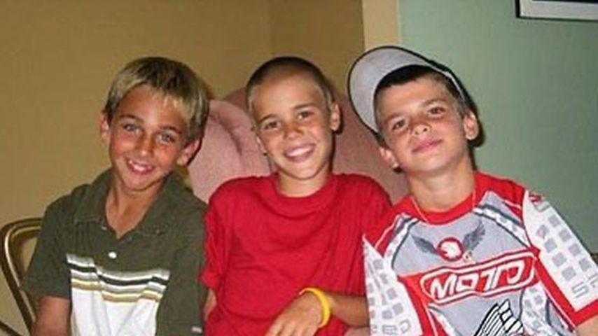 Justin Bieber mit zwei Freunden