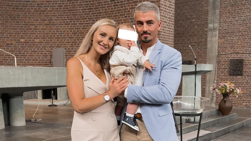 Katharina Wagener und Kevin Yanik mit ihrem Sohn Leonardo im Juni 2022 in Soest