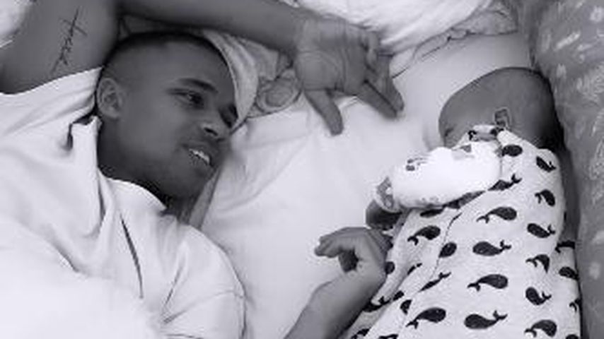 Kevin Nije mit seinem Baby