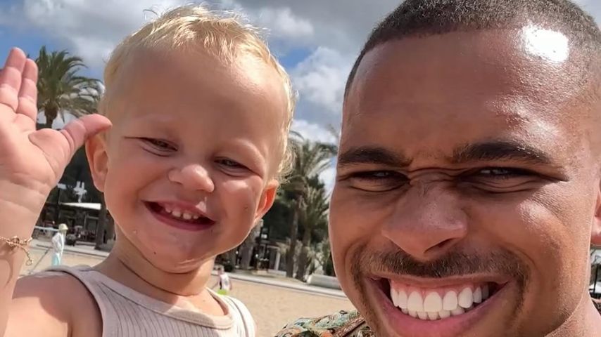 Kevin Njie mit Sohn Ocean, Mai 2024