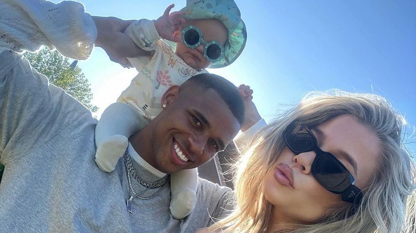 Kevin Njie und Emely Hüffer mit ihrem Sohn Ocean
